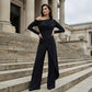 👗✨Women's Elegant One-Shoulder Jumpsuit – Wide-Leg Flow, Wrap Skirt Detail & Premium Breathable Fabric for a Chic Look 💃